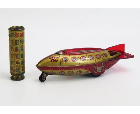 Wells Brimtoy Friction Driven Tinplate and Plastic Space Ship (24cm) and A French Two Draw Telescope decorated with world fla