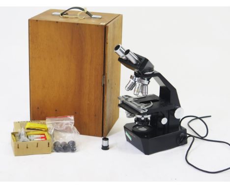 A GS binocular microscope, with revolting multi-nose, mechanical stage with adjustable sub stage condenser, electric lamp ill