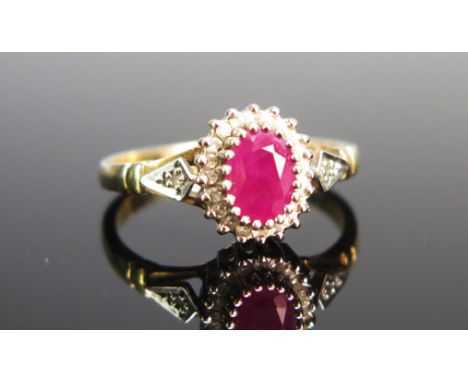 A 9ct Gold, Ruby and Diamond Cluster Ring, size N, hallmarked, 2.64g 
