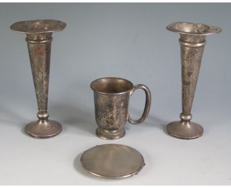 A mixed collection of silver wares, includes a pair of silver specimen vases, circular powder compact, and small mug, weighab