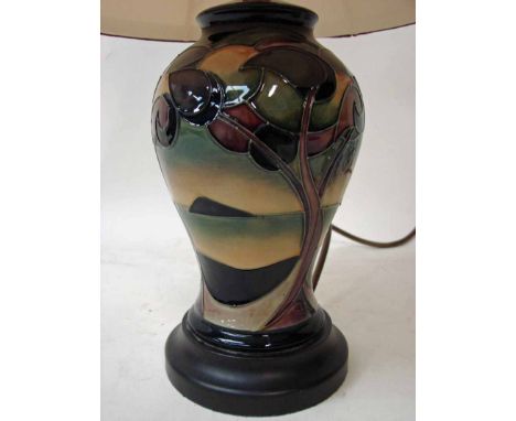 A late 20th century Moorcroft Pottery table lamp of inverted baluster form, tubeline decorated in the Western Isles pattern, 