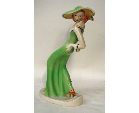 A large Goldscheider figure of a 1930's woman in hat, by Clare Weiss, marked to underside No 51 BA Ltd Made in England, 37cm 