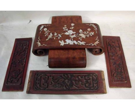 A pair of Chinese hardwood stands of rectangular form with curled scroll feet, the top surface of one intricately inlaid with