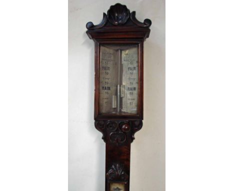 A Victorian carved mahogany stick barometer by T & H Doublet of London, scrolling shell pediment over glazed rectangular ivor