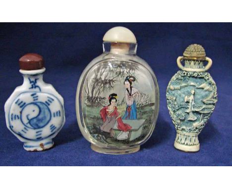 A Japanese glass scent bottle, internally decorated with opposing panels of Bijins in garden landscapes, 8.5cm high, another 