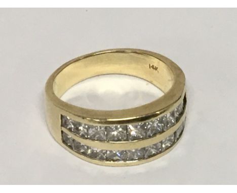 A Gents 14carat gold ring set with two rows of pave set diamonds ring size V weight 11g