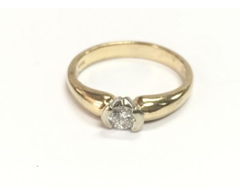 A 9ct gold ring set with moissanite. Size M and 2.64g Postage A