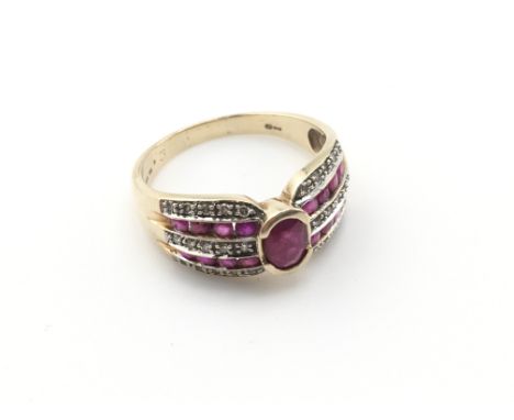 A 9ct gold ruby ring. Size R and 3.92g Postage A