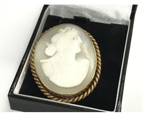 A vintage cameo brooch. Postage category A