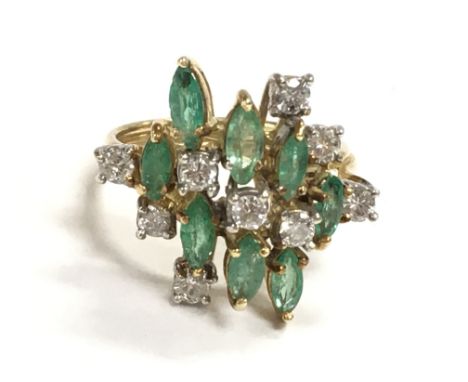 A high carat gold emerald and diamond ring , size L/M. Postage category A
