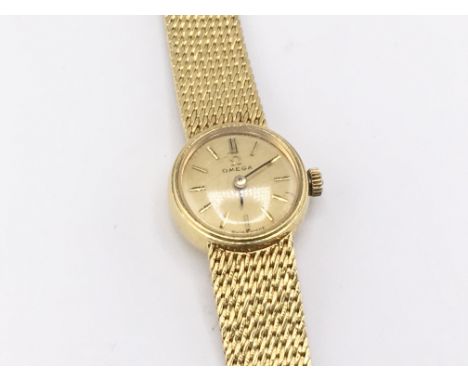 A vintage 18ct gold omega ladies wrist watch circa 1960. Winds and runs. 31.19g