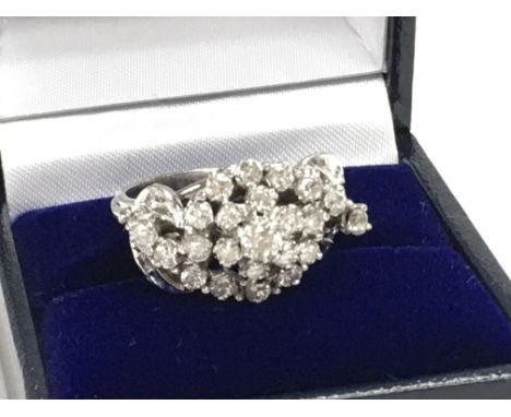 Fancy R/C diamond cluster ring set with R/C diamonds in white metal. Boxed. Diamonds 1.10ct Approx. Ring size Approx O. Posta