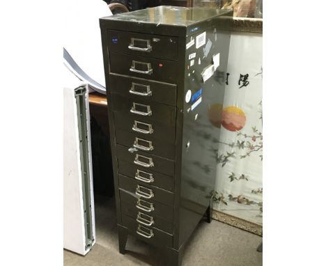 A twelve drawer filing cabinet of watch parts including some Omega. Also including some tools
