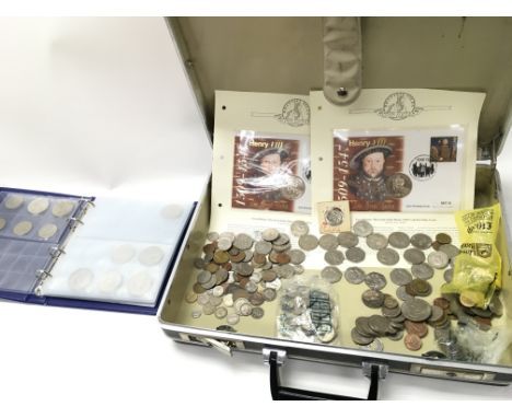 A collection of world coinage including US Canadian etc. Including two first day covers and a chick fil A bicentennial quarte
