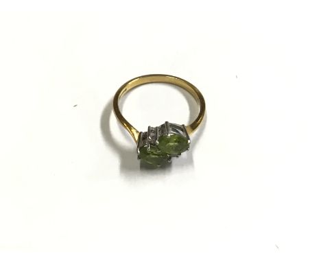 An 18ct gold green tourmaline ring, approx weight 3.65 grams. Approx size R1/2.
