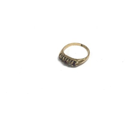 A 18ct gold Ruby and diamond set ring. Approx 3.27 grams.