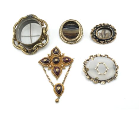 A collection of five vintage brooches and a fob on yellow metal chain. Postage B