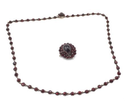 A vintage garnet necklace and brooch. Postage B