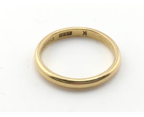 A 22ct gold ring. 2.80g and size K 1/2 Postage A