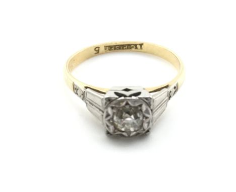 An 18ct gold ring set with small stone. Size K 1/2 and 2.50g