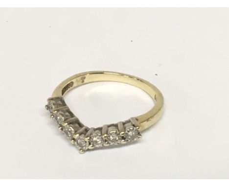 A 9carat gold ring set with a row of small diamonds. Ring size N. Weight 2g
