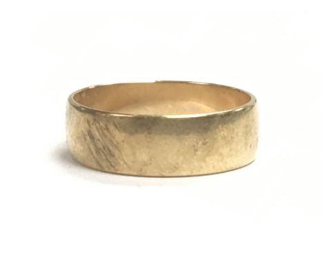 A 9 carat gold wedding band ring , size S. 4.1g. postage category A