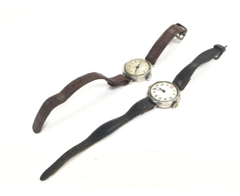 Two vintage silver cased ladies watches. Postage category A