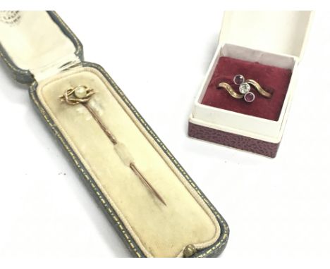 A gold ring (size N) and a 9ct gold tie pearl pin. Postage category A