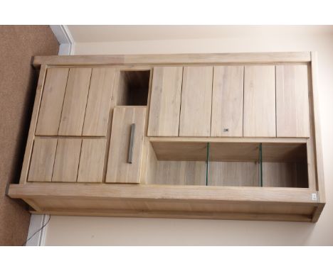Light oak combination bookcase storage cabinet, three graduating cupboards, two glazed shelves, single drawer, W101cm, H191cm