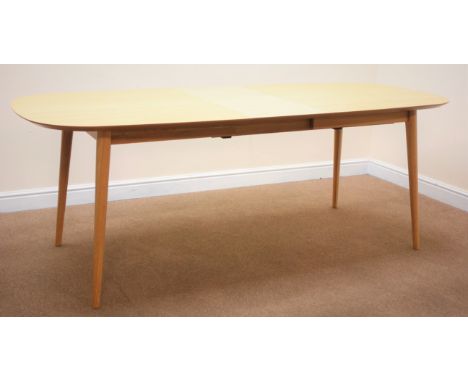 Rodgers of York light oak oval extending dining table, single leaf, turned tapering supports, W216cm, H77cm, D91cm Condition 