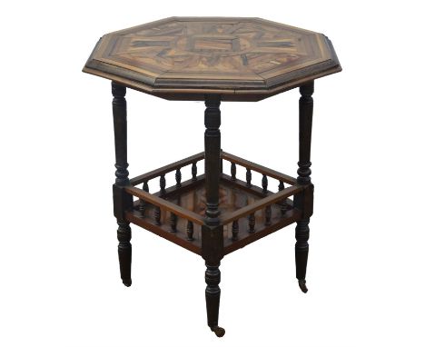 An Edwardian occasional table, probably Ceylonese Colonial, the octagonal parquetry specimen wood top dated 1910, on turned p