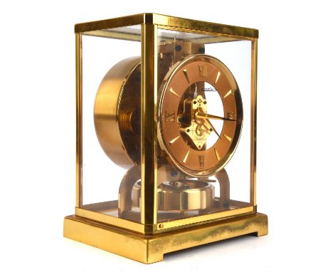 A Jaeger-Le Coultre, gilt brass cased Atmos clock, serial number 86028, housed in a canted rectangular case, 22.5cm high, wit