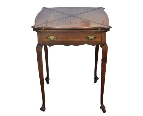 An Edwardian walnut envelope card table, the swivel top above a drawer, on turned tapered legs with ceramic castors, H 74cm, 