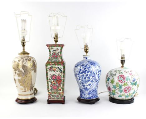 A late 19th century  pottery table lamp (converted), decorated all over with exotic flowers, 25cm high, and three further mod
