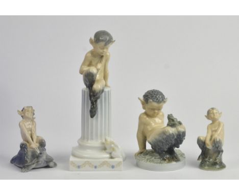 Four Royal Copenhagen Faun model groups comprising ; Faun on a column, 22cm high, No 456, faun on a tortoise, No 858, faun wi