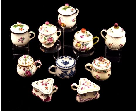 A collection of 18th and 19th century custard cups and covers including Vienna, Mennecy, Meissen style and others. (10)Condit