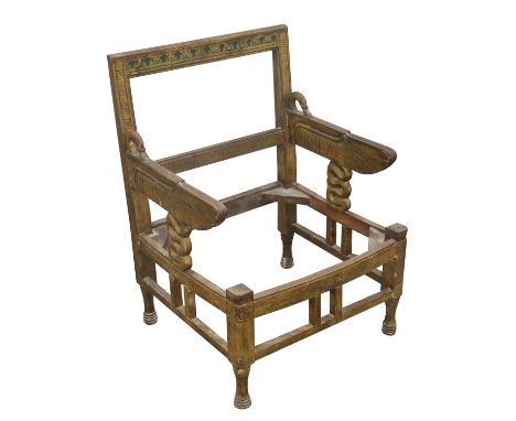 An Egyptian Revival gilt decorated armchair, circa 1900, decorated incised carved, the top rail polychrome decorated above st