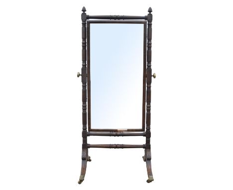 A George IV mahogany cheval mirror, with ring turned uprights and hipped sabre legs with brass capped castors, H 160cm, W 75c