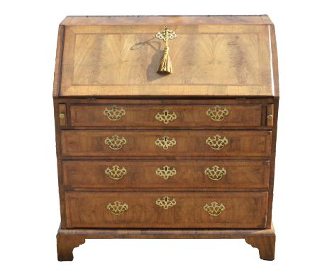 A George II walnut and feather banded bureau, the interior fitted, above four long graduated drawers, on bracket feet, H 100c