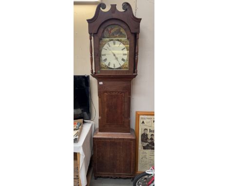 A 30 hour arched dial grandfather clock featuring a hunting scene.