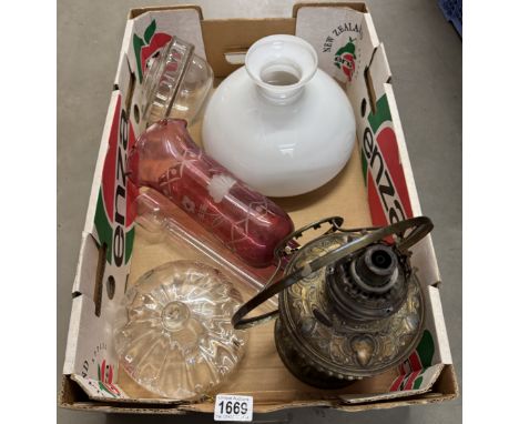 A quantity of Victorian oil lamp parts including fonts, shades, spelter lamp etc