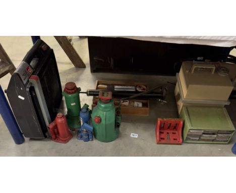 A tile cutter, bottle jacks, shoe cleaning kit etc