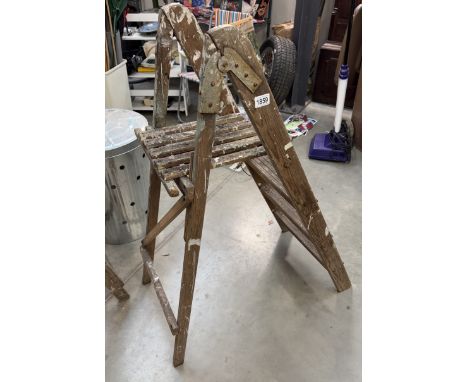 A vintage wooden step ladder