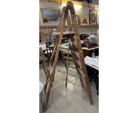 A vintage wooden step ladder