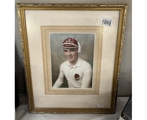 A framed &amp; glazed hand tinted photograph of a capped rugby player (1954 - 55)