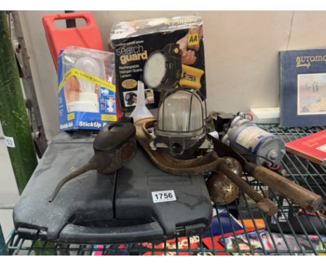 A vintage oil can, search light etc