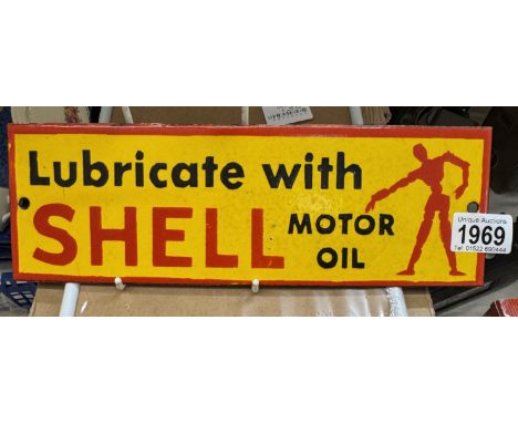 A retro Shell Motor Oil Stick Man enamel sign. 30.5 x 10cm