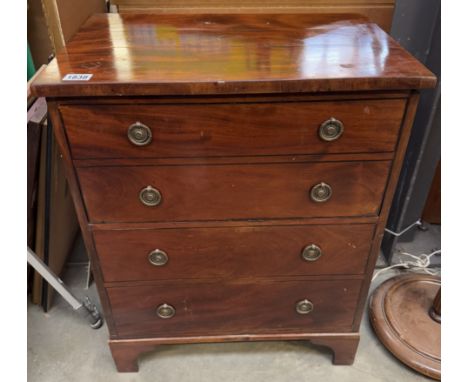 A Georgian commode in form of a chest of drawers converted into a cellarette