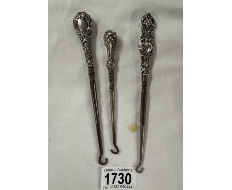 3 Silver handled button hooks
