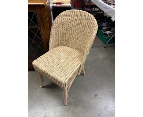 A Lloyd Loom style chair